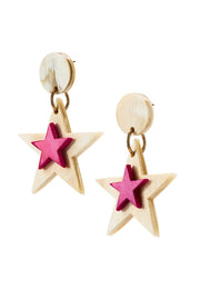Close up image of pink star earrings made from natural horn material