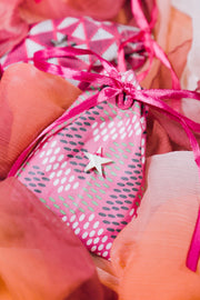 handmade gift bag made from local ugandan pink fabric